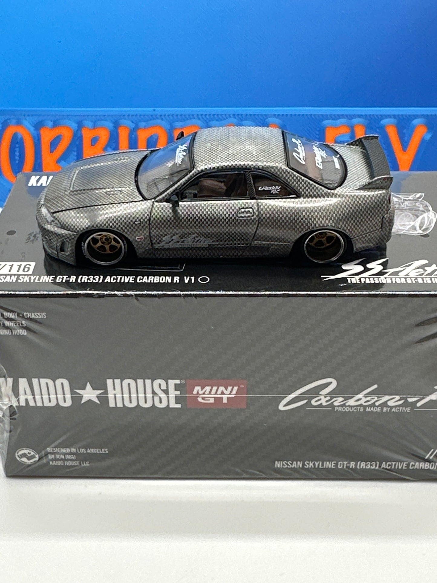 Kaido House (x MiniGT) - Raw Chase Release #116 - Nissan Skyline GT-R (R33) Active Carbon R V1