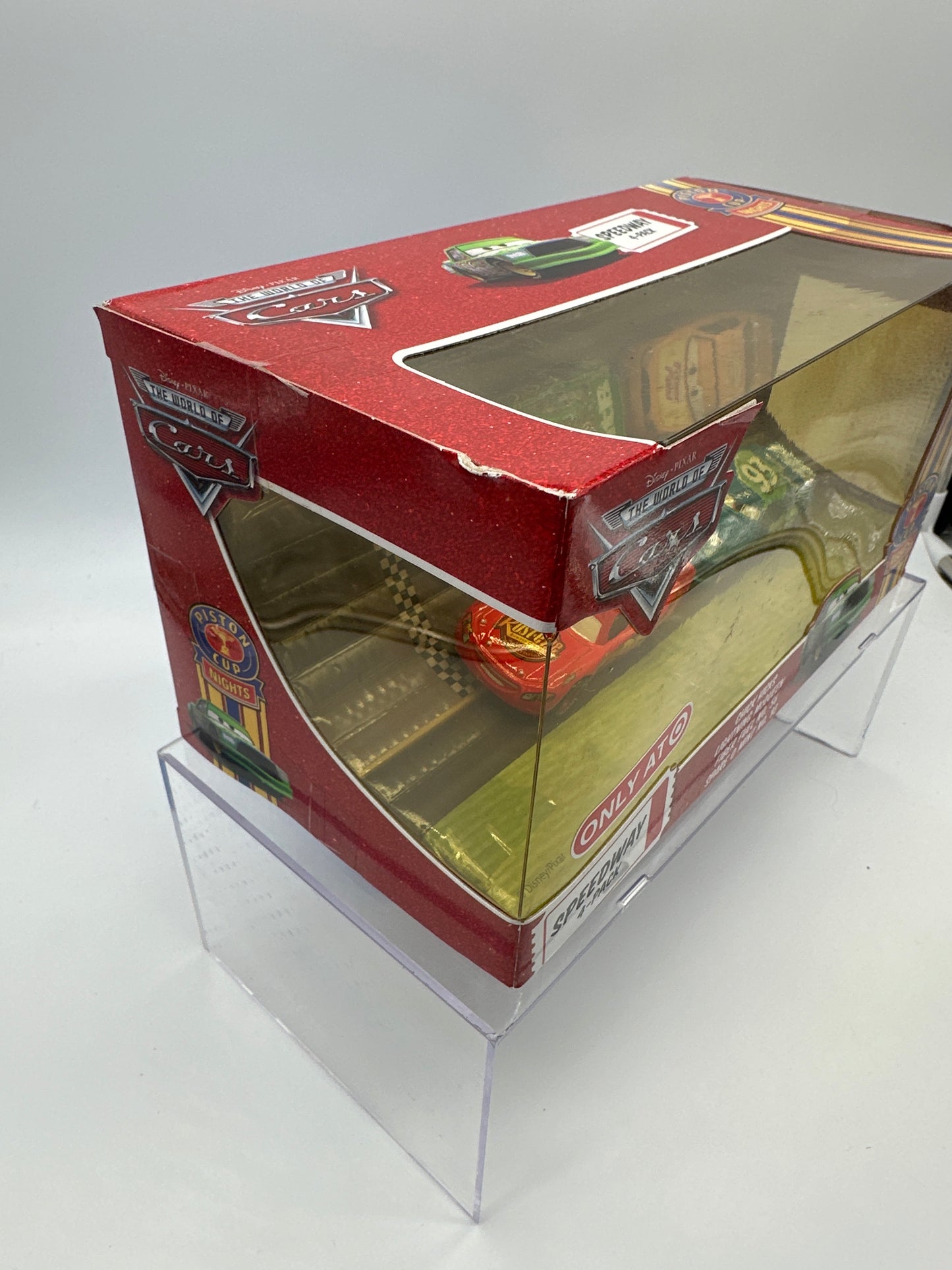 Disney Pixar Cars Movie - Target Exclusive Piston Cup Nights Series - Speedway 4 Pack Set w/ Chick Hicks, Lightning McQueen, Fiber Fuel, Spare O Mint