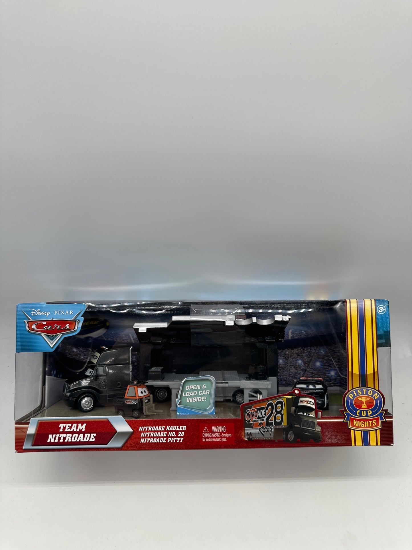 Disney Pixar Cars Movie - Piston Cup Nights - Team Nitroade Hauler, Racer, and Pitty Multipack Set