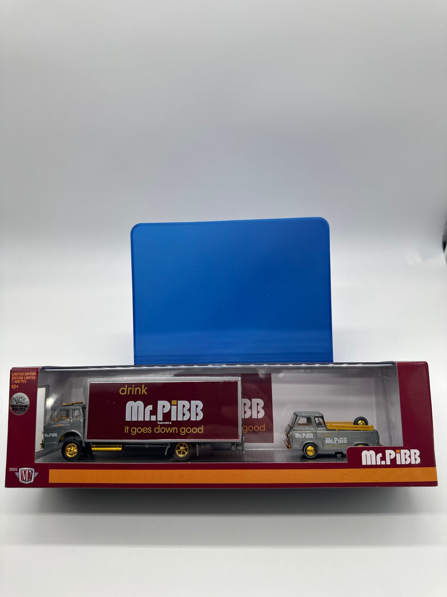 M2 Machines Hauler - Mr. Pibb Series - 1966 Ford C-950 Truck & 1964 Ford Econline Truck - Raw Chase