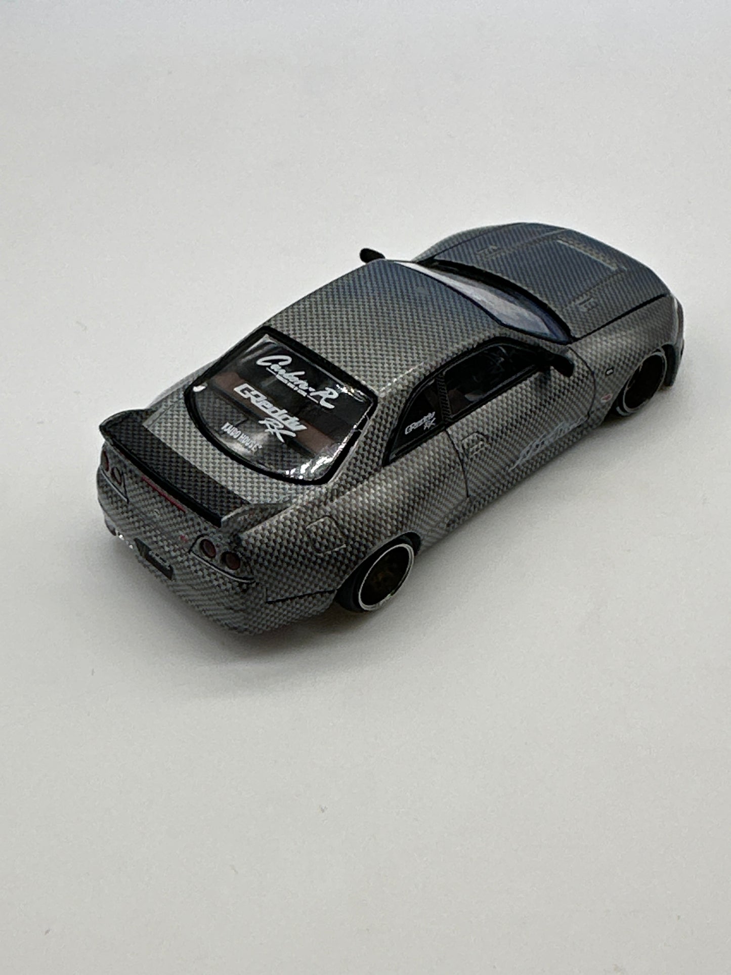 Kaido House (x MiniGT) - Raw Chase Release #116 - Nissan Skyline GT-R (R33) Active Carbon R V1