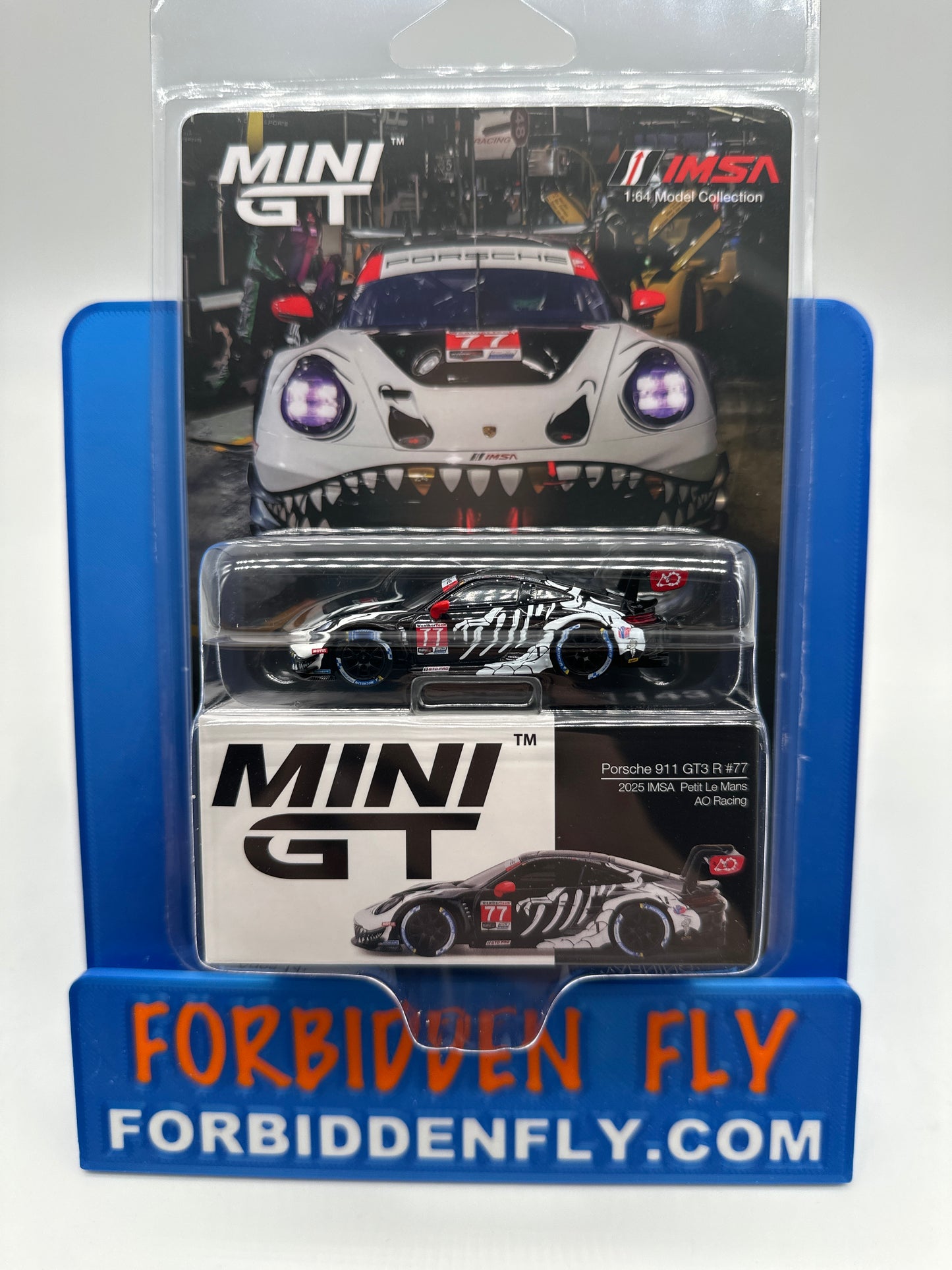 Mini GT Regular Release #1143 - “Skeleton Rexy” Porsche 911 GT3 R #77 (2025 IMSA Petit Le Mans AO Racing)