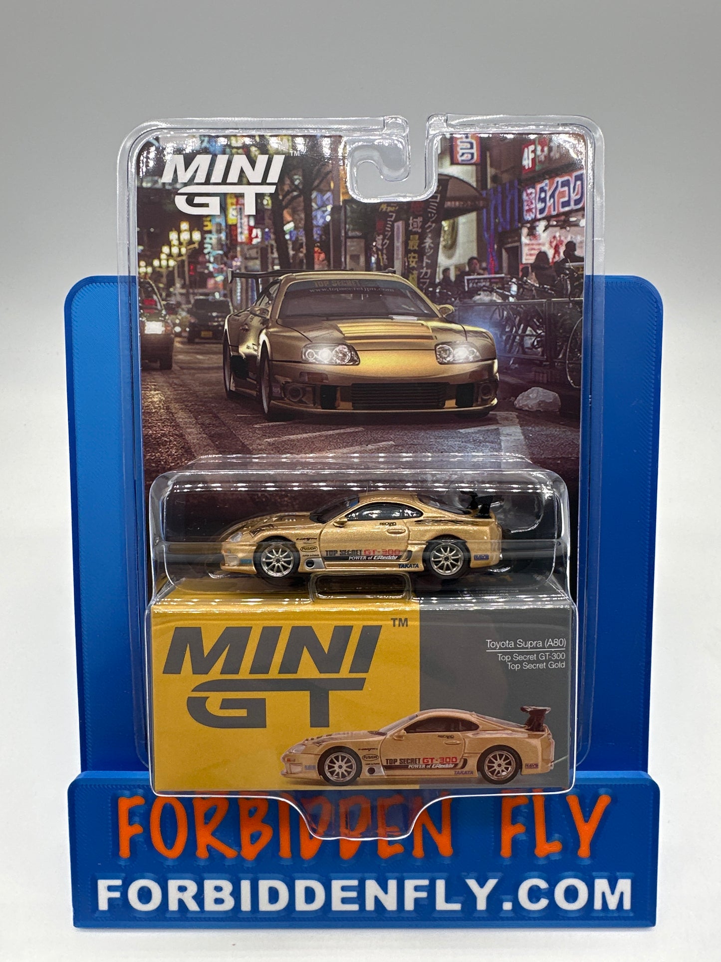 Mini GT #961 - Toyota Supra (A80) - Top Secret GT-300 - Top Secret Gold - Regular Version