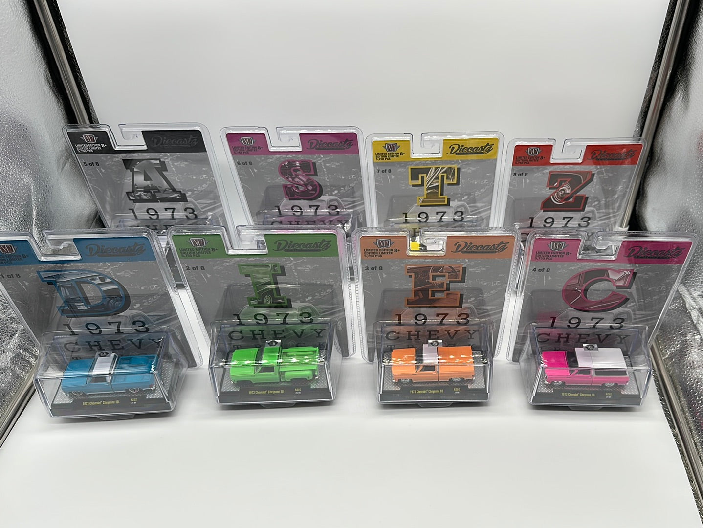 M2 Machines Carded Acrylic - DiecastZ Riverside Show Exclusive Series RZ02 - Complete Set of 8 Various Colors & Model Chevrolet Cheyenne 10