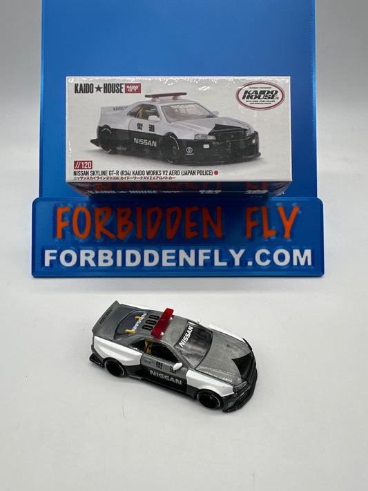Kaido House (x MiniGT) - Chase Release #120 - White Nissan Skyline GT-R (R34) Kaido Works V2 Aero (Japan Police)