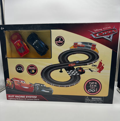 Disney Pixar Cars Movie - Slot Car Racing System - Playset with Lightning McQueen & Jackson Storm (w/ Track)