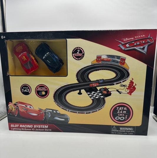Disney Pixar Cars Movie - Slot Car Racing System - Playset with Lightning McQueen & Jackson Storm (w/ Track)