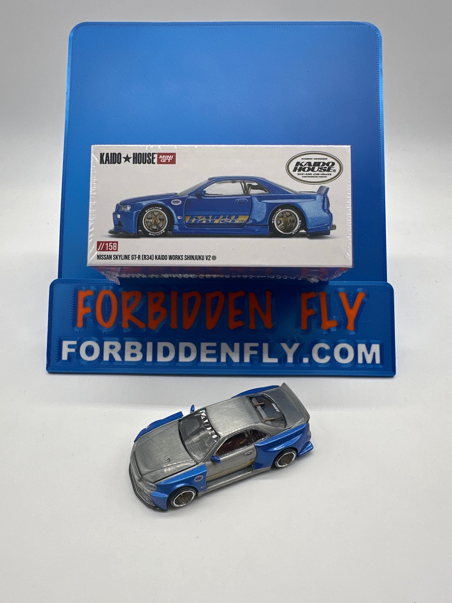 Kaido House (x MiniGT) - Raw Chase Release #158 - Nissan Skyline GT-R (R34) Kaido Works Shinjuku V2