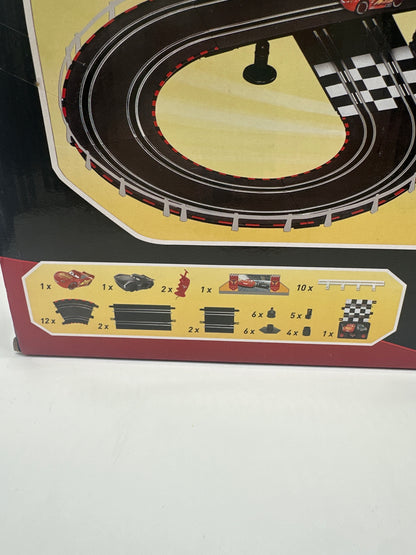 Disney Pixar Cars Movie - Slot Car Racing System - Playset with Lightning McQueen & Jackson Storm (w/ Track)