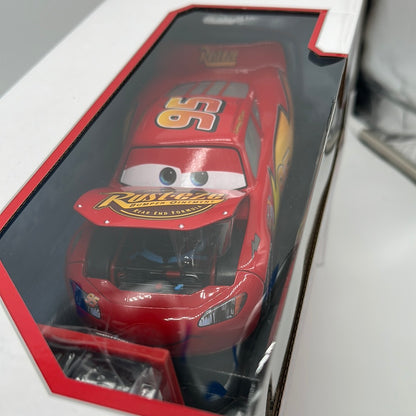 Jada 1:24 Scale - Disney Pixar Cars Deluxe - Exclusive Tire Rack Edition Lightning McQueen