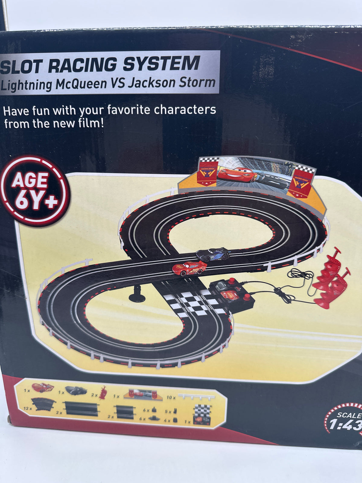 Disney Pixar Cars Movie - Slot Car Racing System - Playset with Lightning McQueen & Jackson Storm (w/ Track)