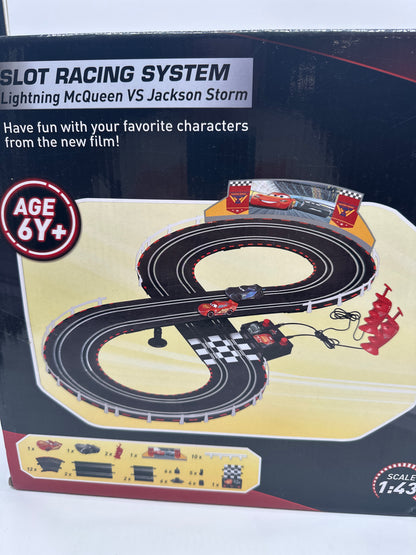 Disney Pixar Cars Movie - Slot Car Racing System - Playset with Lightning McQueen & Jackson Storm (w/ Track)