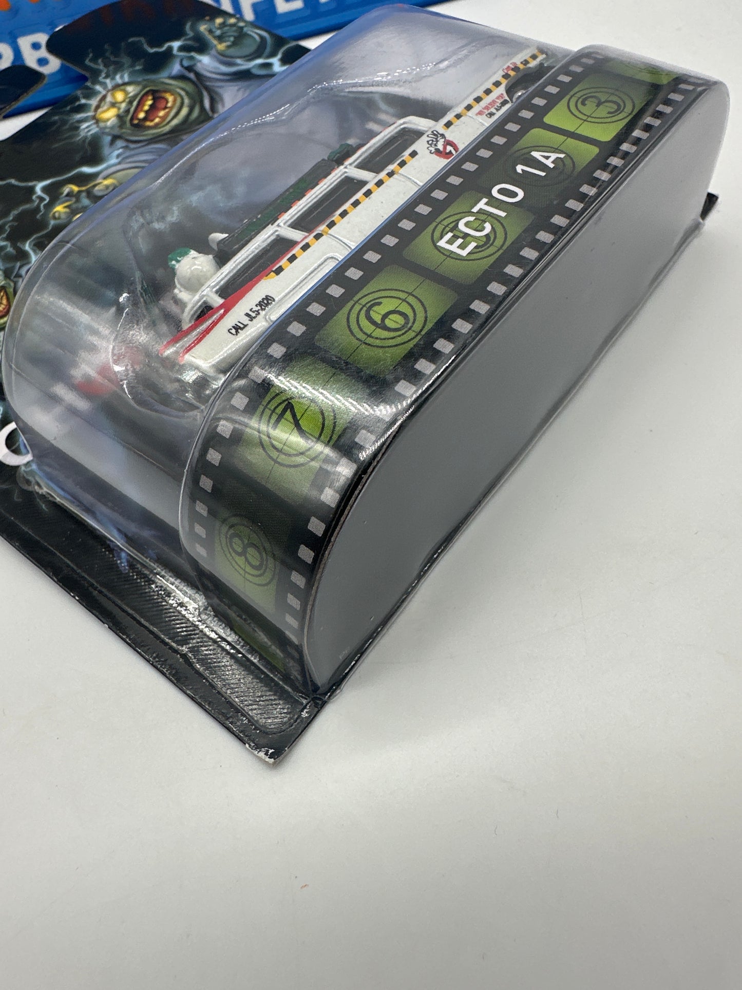 Hot Wheels 2014 Retro Entertainment Premium Single - Ghostbusters Ecto 1A (Movie Reel Packaging)