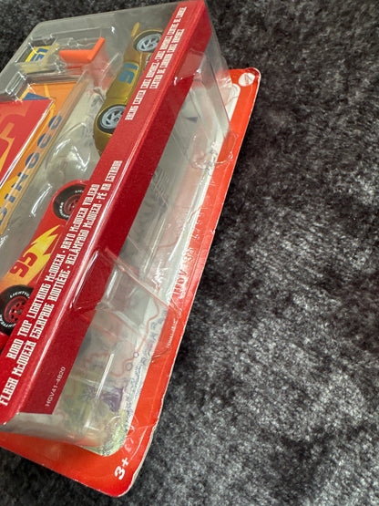 Disney Pixar Cars On the Road - Two Pack - Road Trip Lightning McQueen & Racing Center Cruz Ramirez w/ Signs
