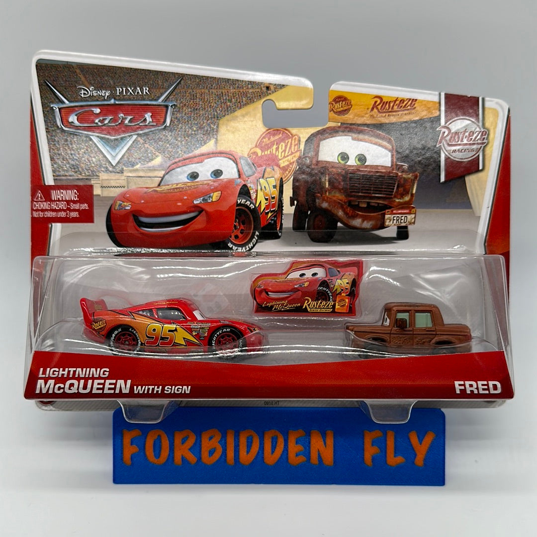 Disney Pixar Cars Movie - Rust-Eze Racing Two Pack - Lightning McQueen with Sign & Fred