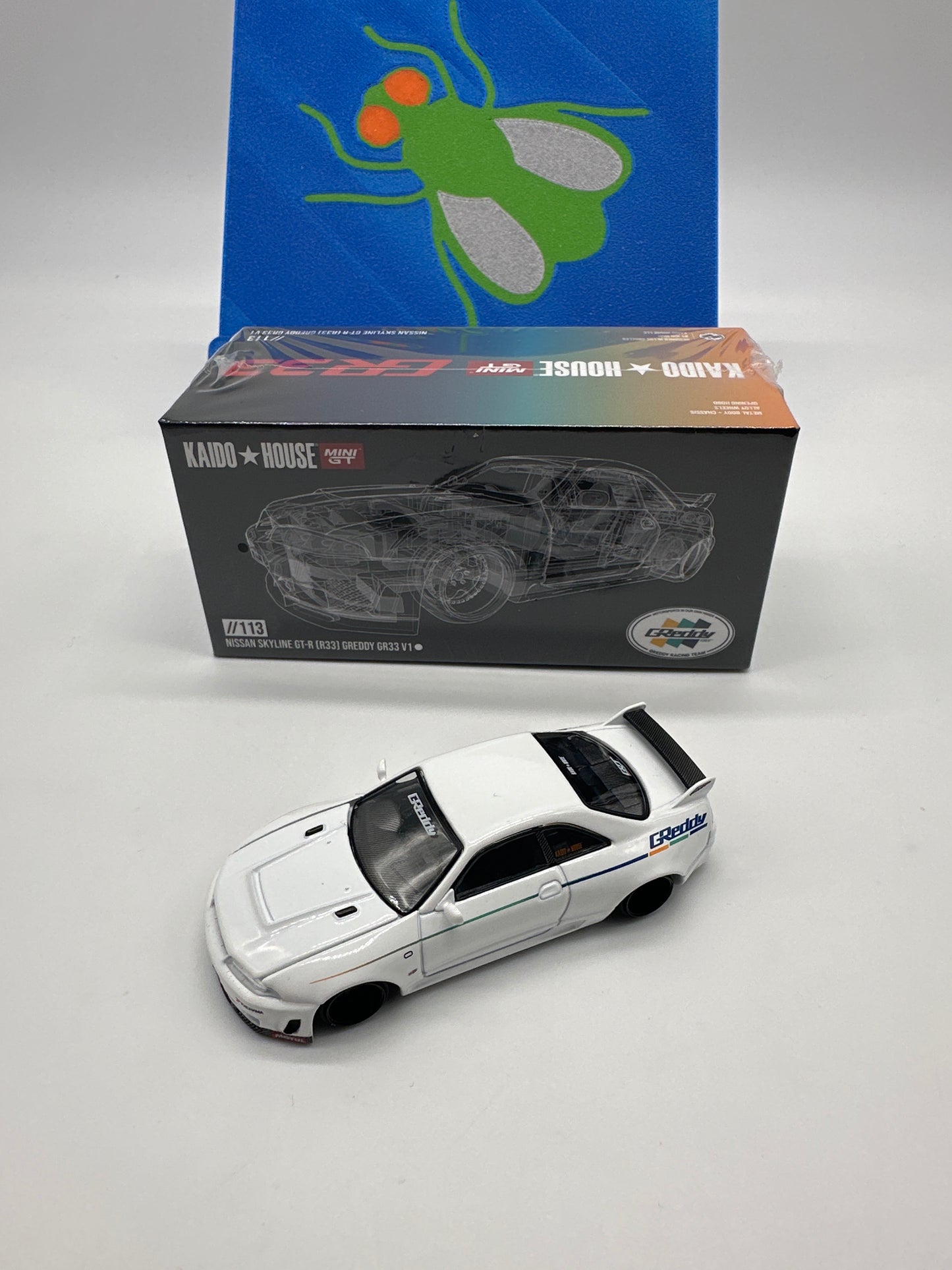 Kaido House (x MiniGT) - Regular Release #113 - White Nissan Skyline GT-R (R33) GReddy V1