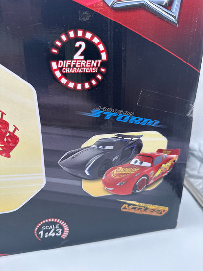 Disney Pixar Cars Movie - Slot Car Racing System - Playset with Lightning McQueen & Jackson Storm (w/ Track)