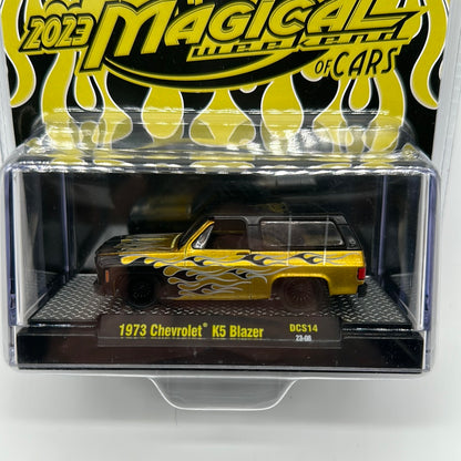 M2 Machines Acrylic Boxed Car  - 2023 Magical Weekend Of Cars Convention Exclusive - 1973 Chevrolet K5 Blazer - Gold
