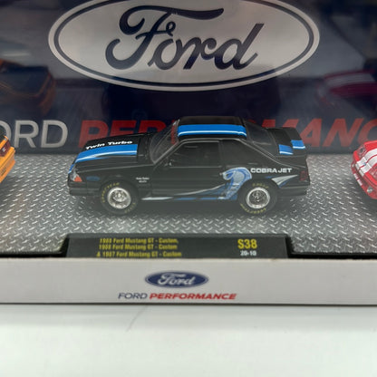 M2 Machines - Acrylic Boxed Release S38 - 1980’s Ford Mustang  Foxbody 3 Pack